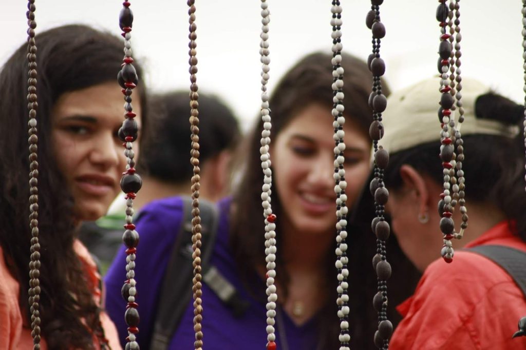 Handmade seed jewelry on our journey to the amazon