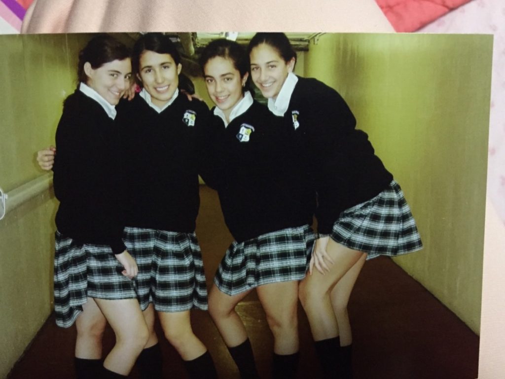 4 girls in Catholic school uniform