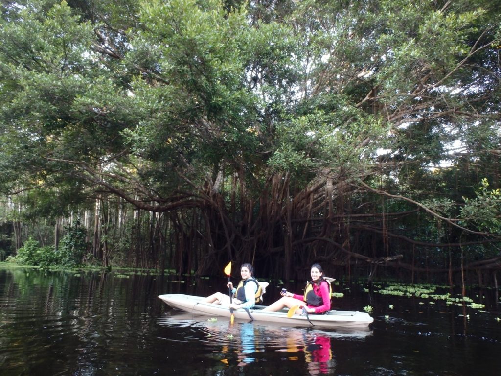 Me and my sister kayaking in the Amazon river in Peru