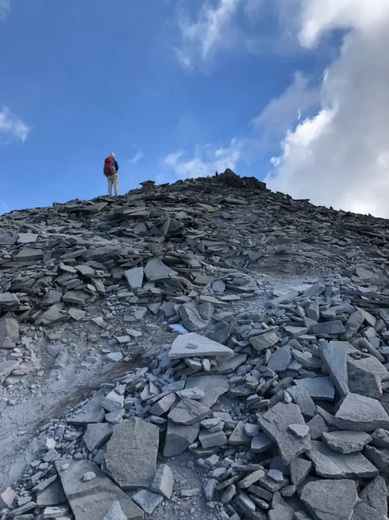 Person hiking up rocky face of the Nevado de Toluca