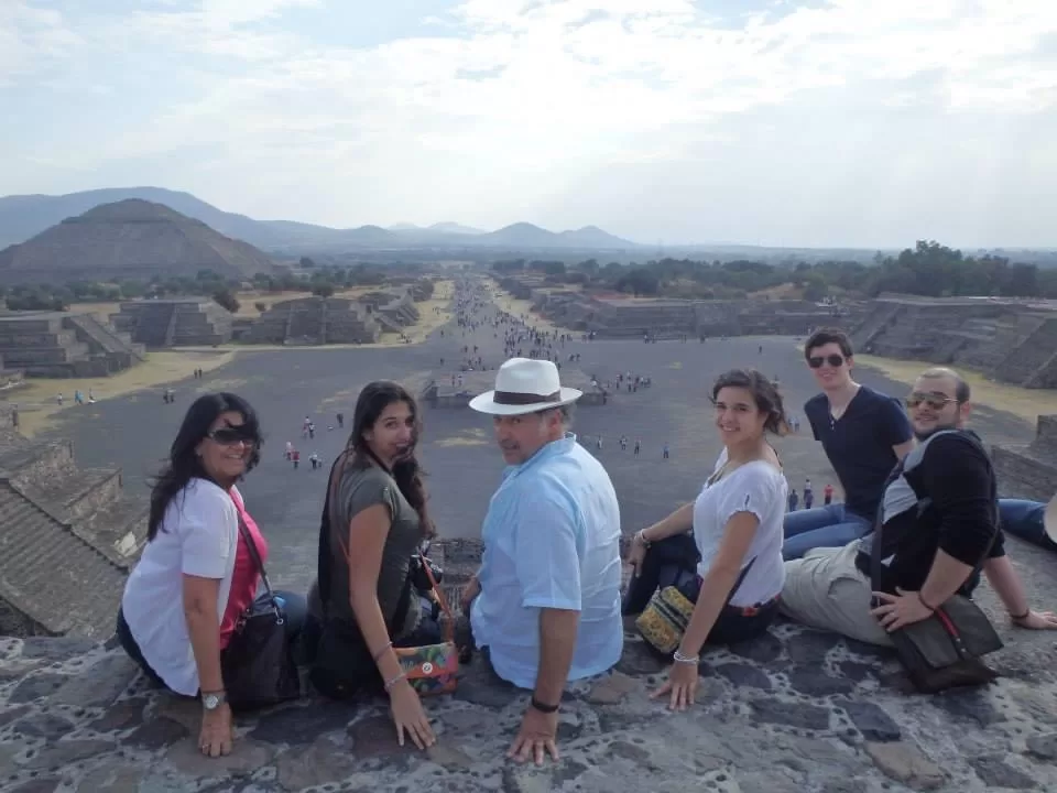 Meand my family on top of the pyramid of the moon overlooking street of the dead and the pyramid of the sun