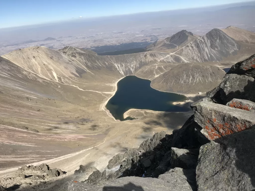 View of the crater lake from the summit of the Nevado de Toluca, Pico del Fraile, after a long hike near Mexico City