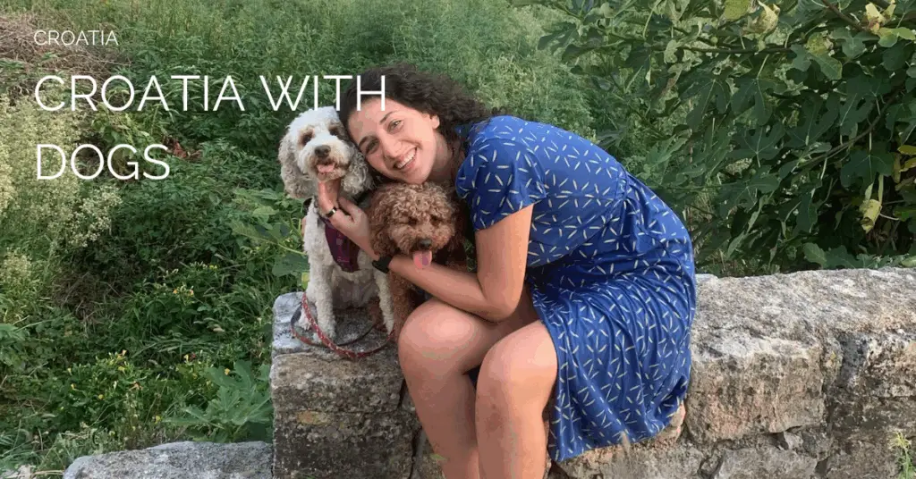 a photo of a woman in a blue dress with hugging two dogs, one white and one brown, with the text Croatia with dogs