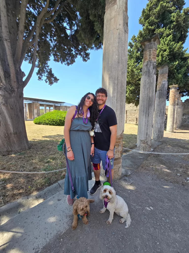 My husband, me and our two dogs inside the Casa del Fauno in Pompeii 