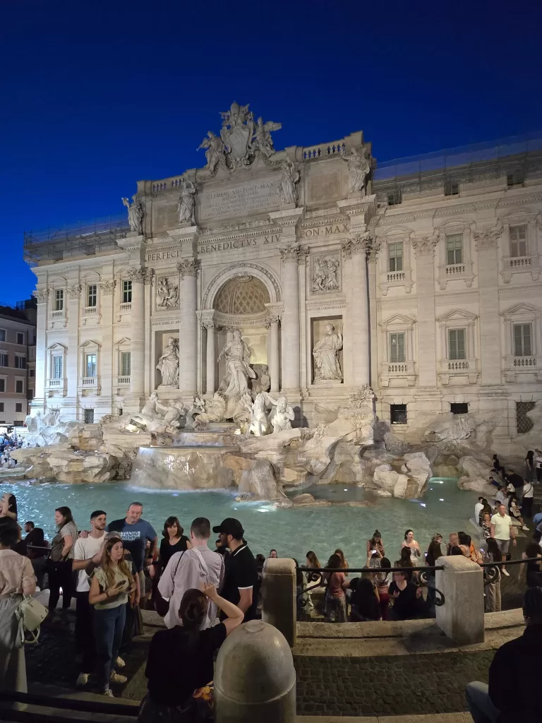Trevi fountain lit up at night in Rome