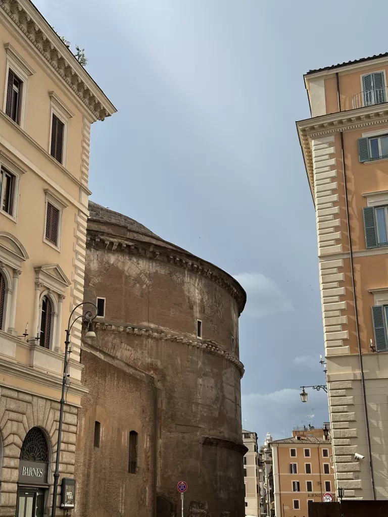 Pantheon peeking out from the streets of rome you can find while traveling with you dog