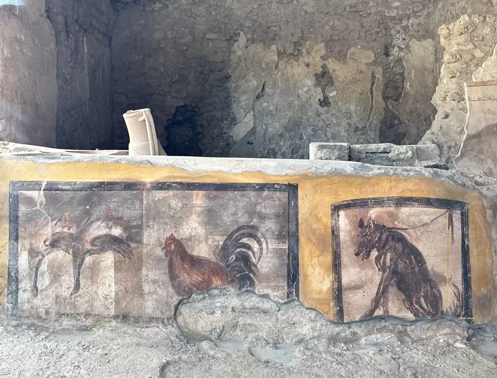 Frescoes painted at thermopolium or a sort of ancient cafeteria in Pompeii