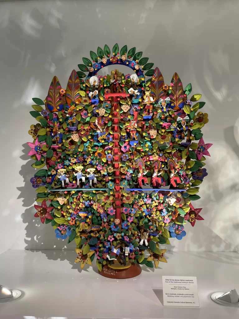 Arbol de la vida a colorful mexican folk art depicting the origins of life including Bible origins using pre-hispanic ceramic techniques displayed at the museo de arte popular in mexico city