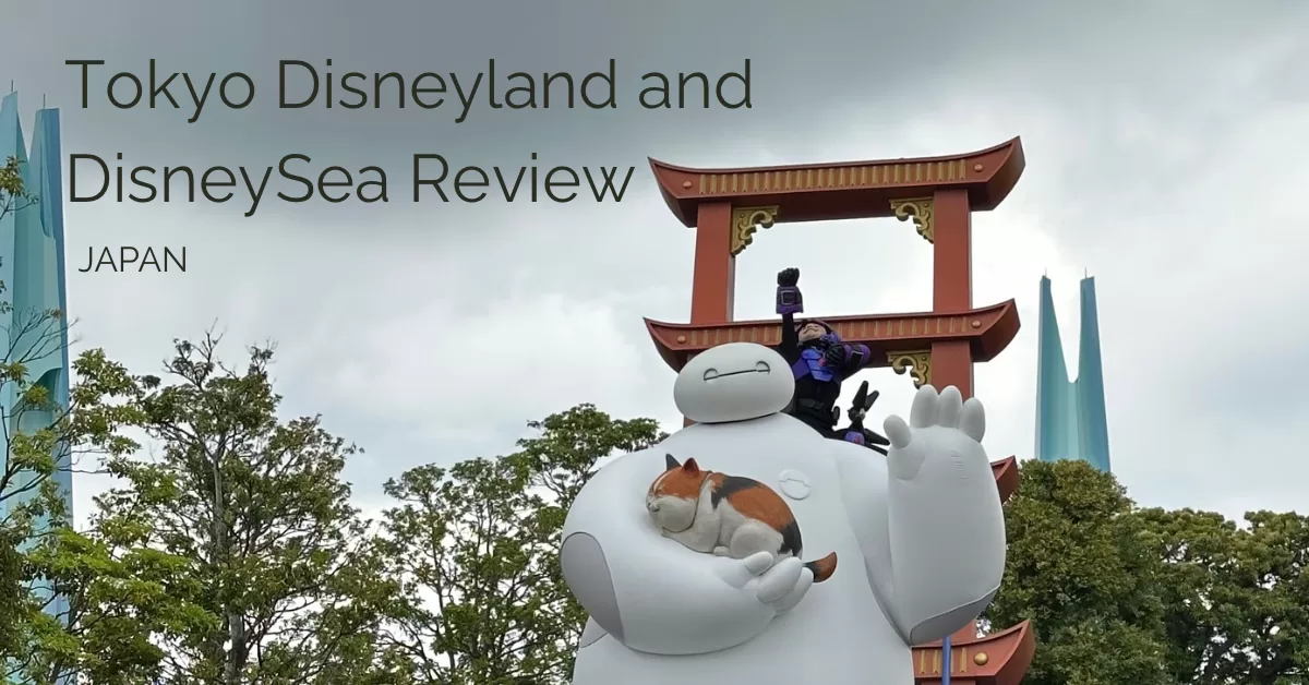 Baymax parade float with mochi the cat in Tokyo Disneyland with the text Disneyland and DisneySea Review and under it Japan