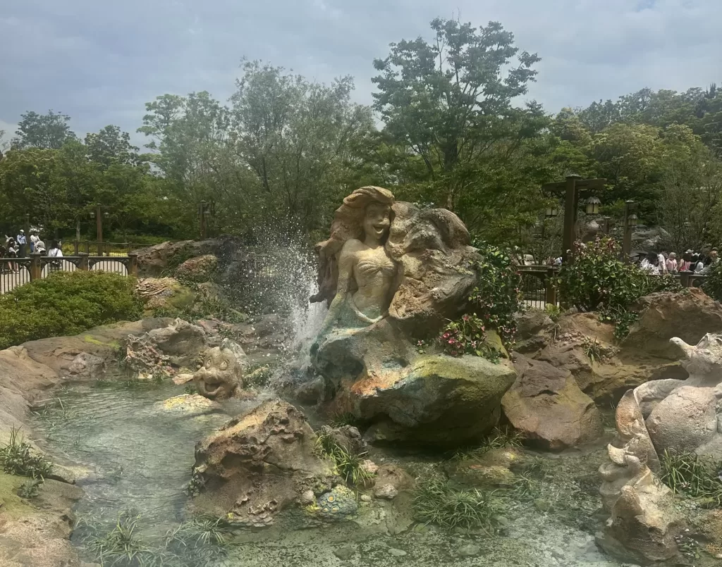 The little mermaid in rock at a fountain in DisneySea Fantasy Springs